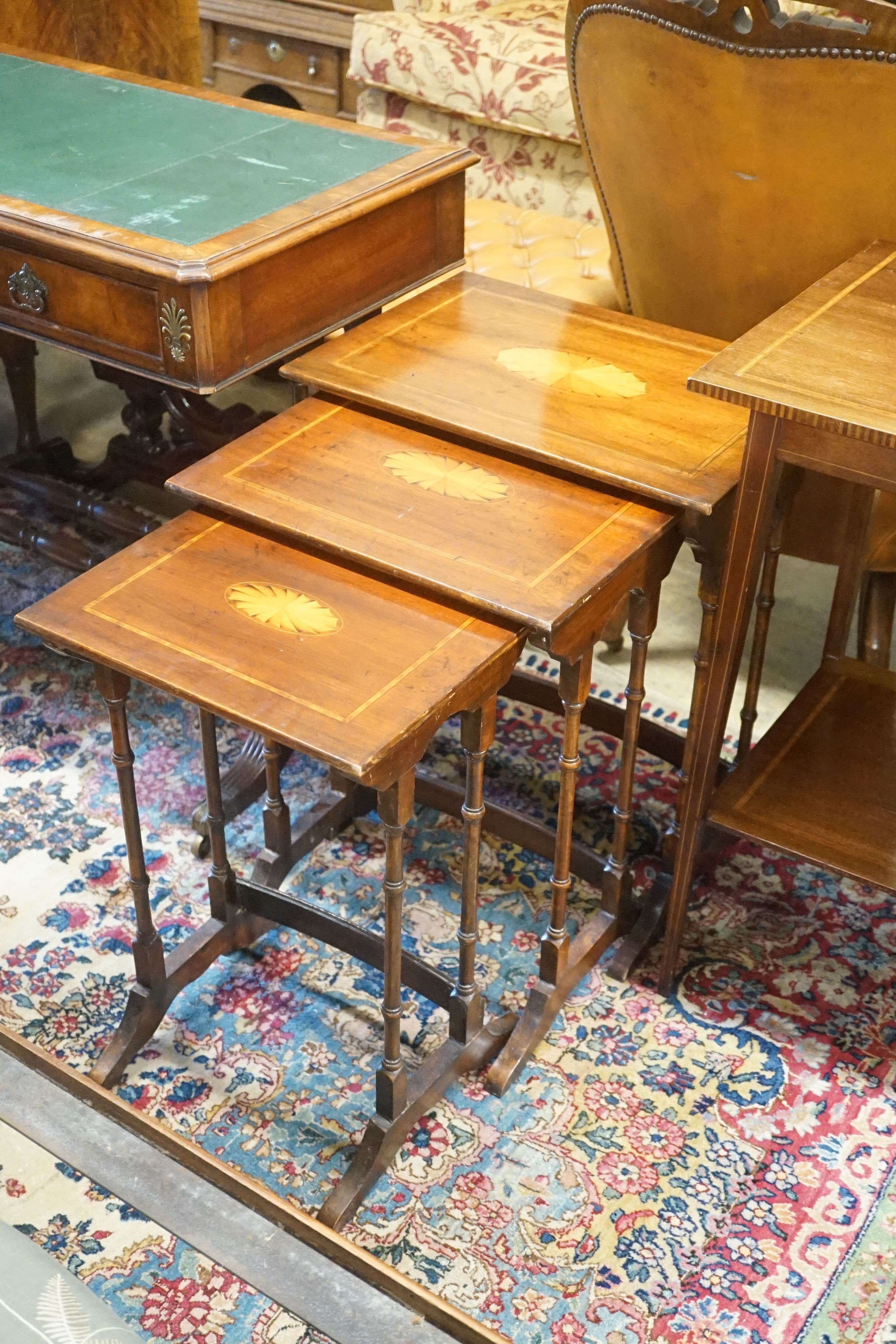 An Edwardian satinwood banded two tier occasional table, wdith 43cm depth 43cmm height 72cm, together with a nest of three inlaid mahogany tea tables